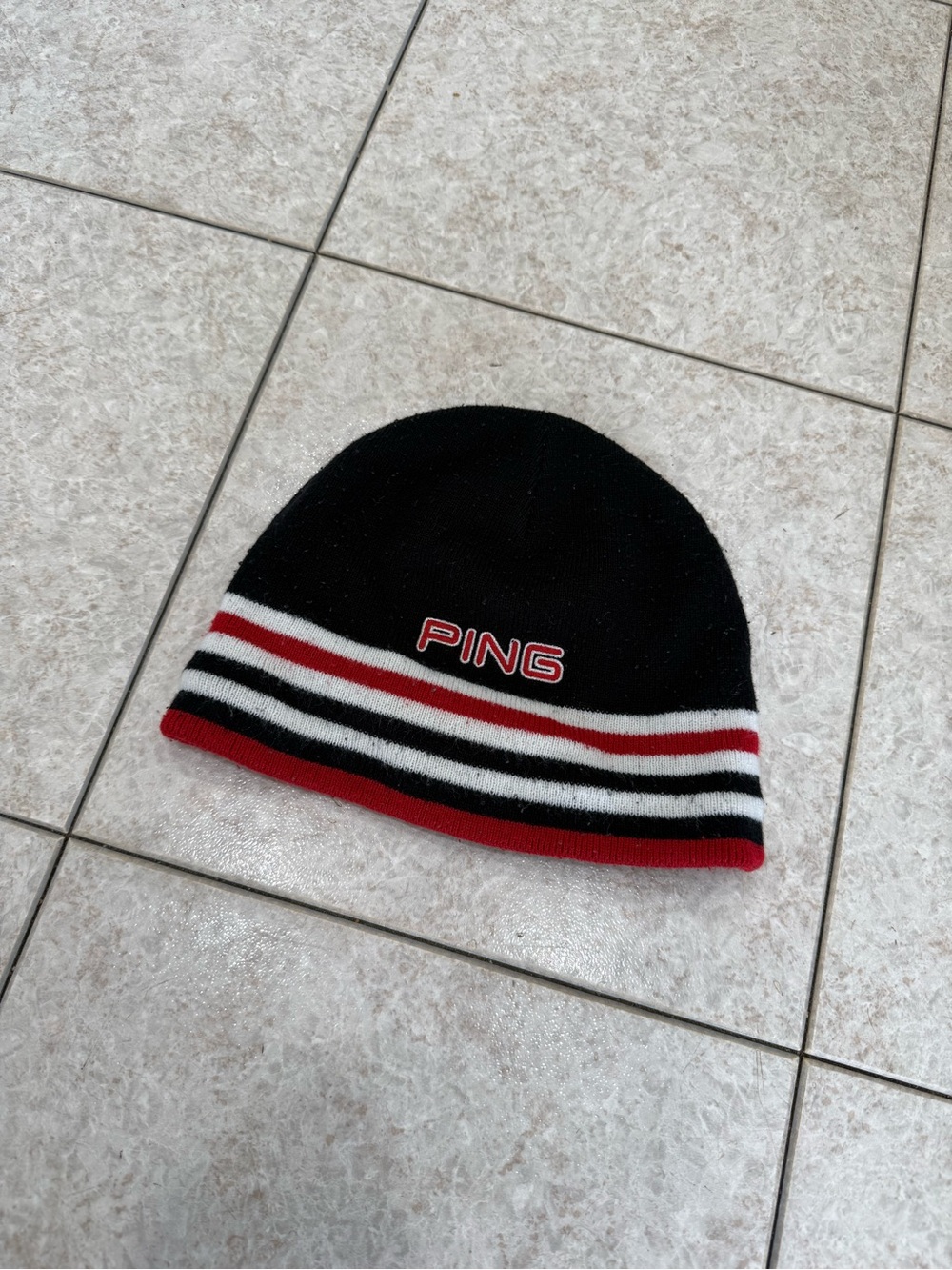 PING Black Beanie with Red, White and Black Stripes